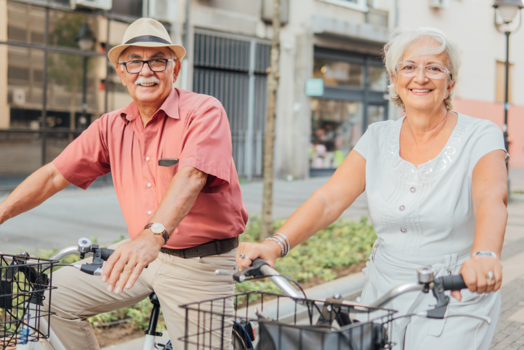 older couple riding bike