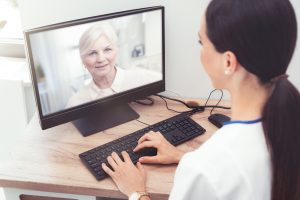 Doctor On a Virtual Visit With Patient