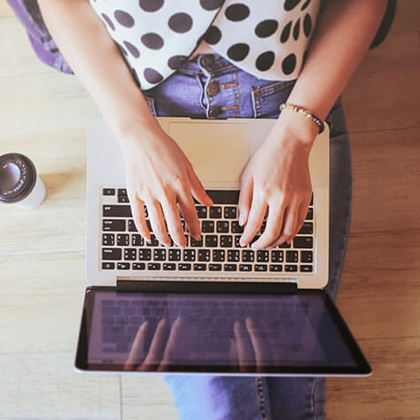 Woman Working on a Laptop